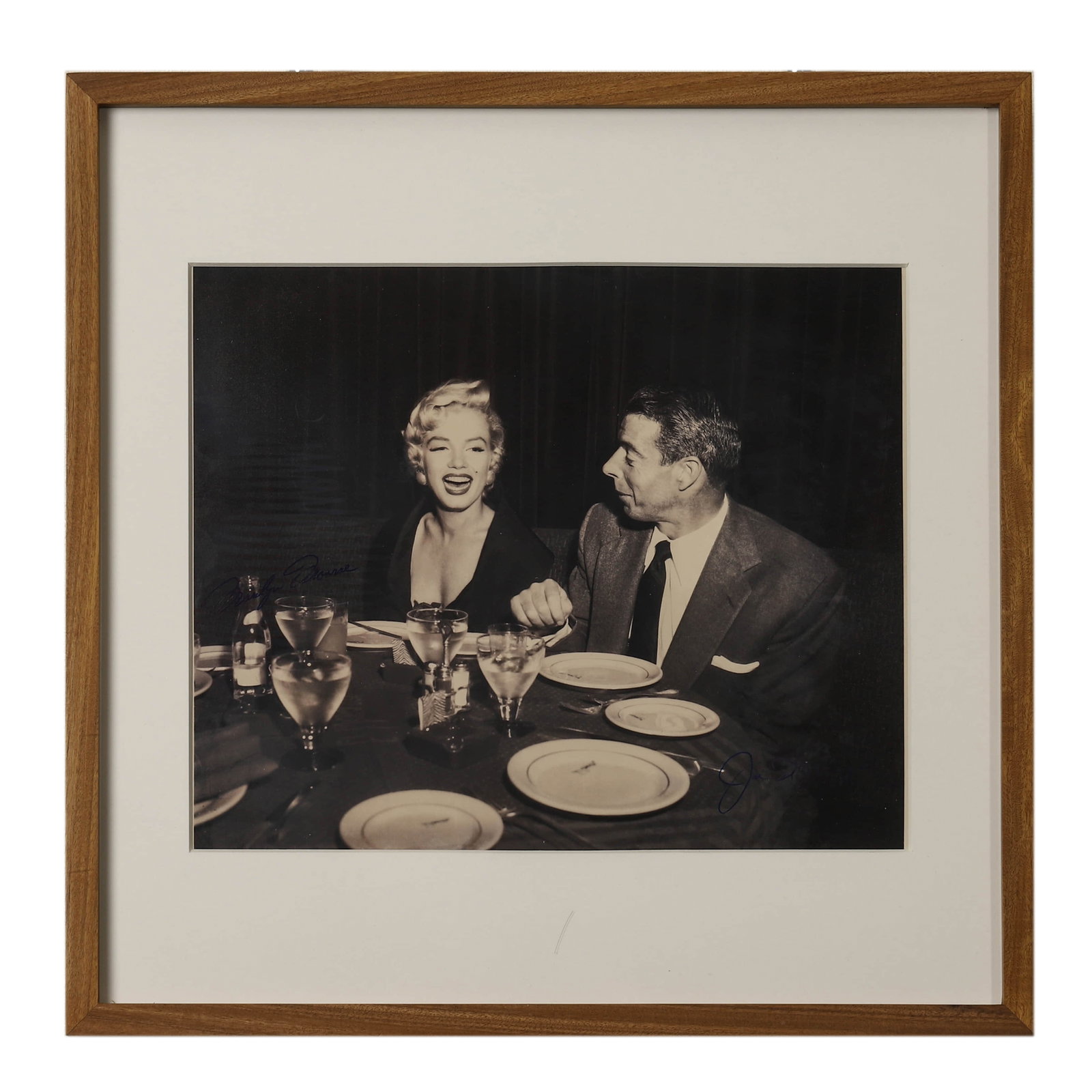 MARILYN MONROE DINING WITH JOE DIMAGGIO, CIRCA 1953: Marilyn Monroe Dining with Joe DiMaggio, circa 1953 Gelatin silver print, signed by both Marilyn Monroe and Joe DiMaggio in ink Dimensions: Image 8 1/4 × 9 7/8 in. (21.1 × 25.2 cm); Frame 13 5/8 × 