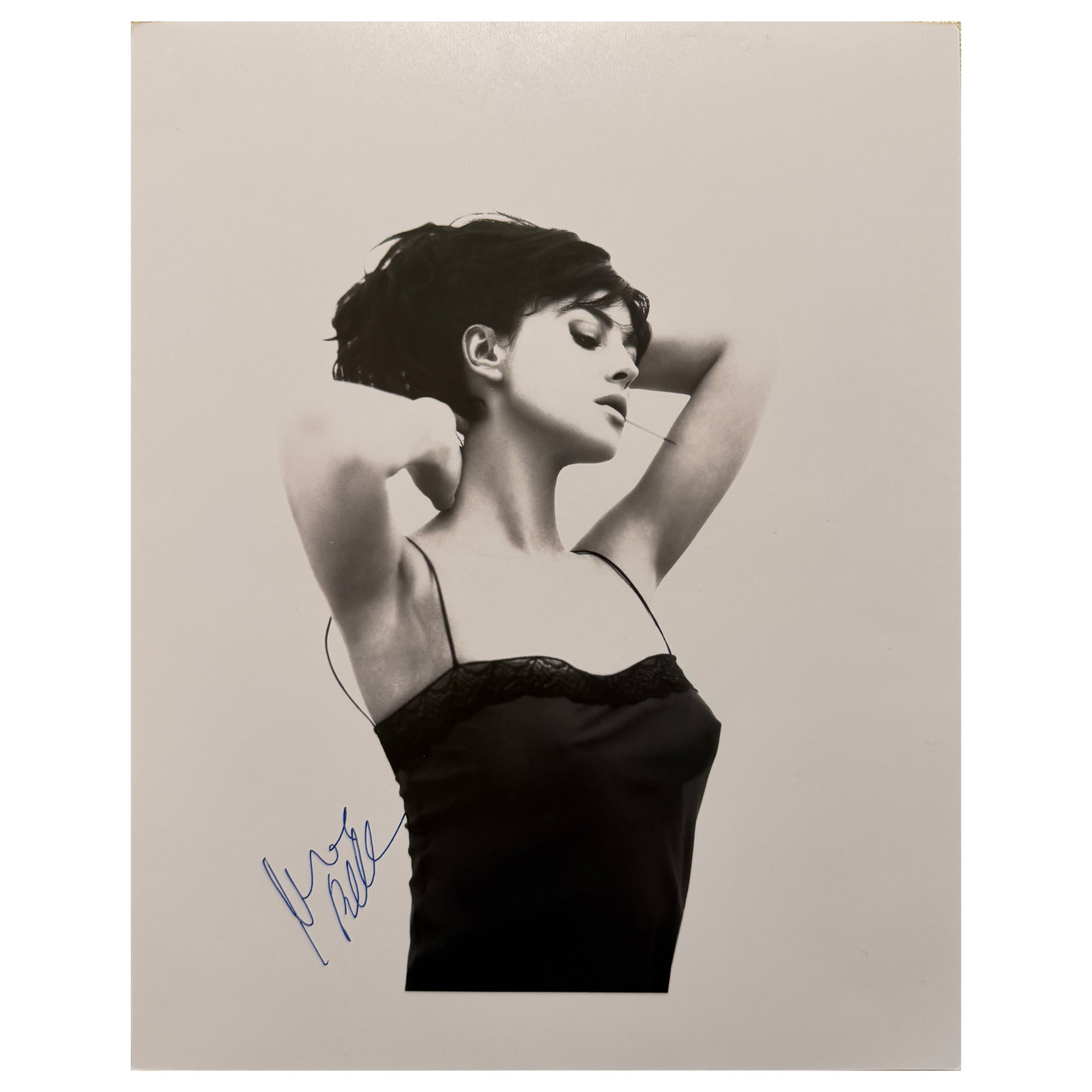 MONICA BELLUCCI PORTRAIT: Description Title: Monica Bellucci Portrait Materials: Gelatin silver printSignature: Signed "Monica Bellucci" in blue ink on the left side Size: Photograph 9 9/16 × 11 in. (24.3 × 28 cm)