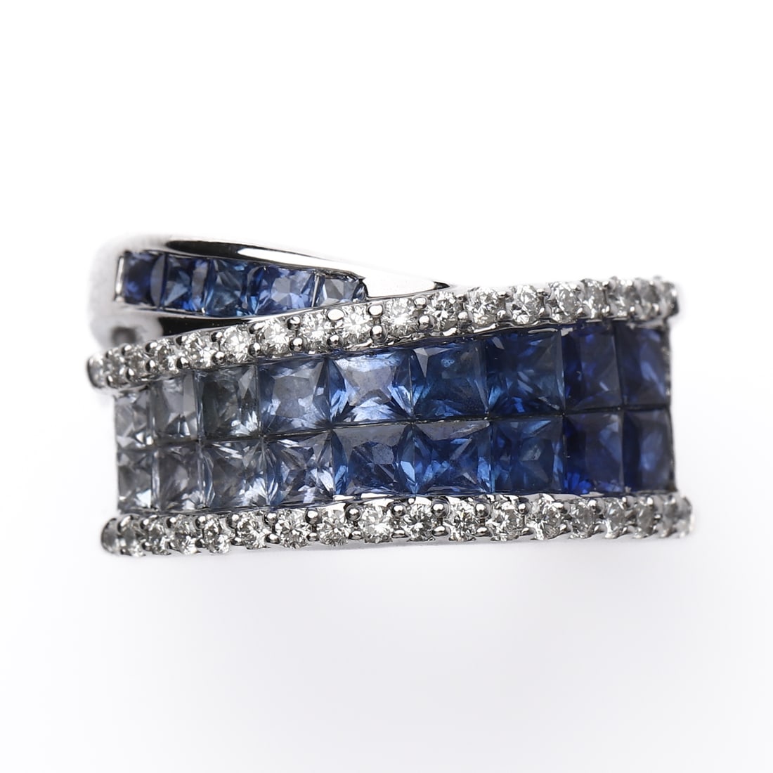 K18 WHITE GOLD SAPPHIRE AND DIAMOND RING: Dimensions: Inner diameter: 16.8 mm (0.66 in); Weight: 7.9 g Description: Crafted in 18k white gold, this elegant ring features approximately 2.50 carats of square-cut sapphires arranged in a