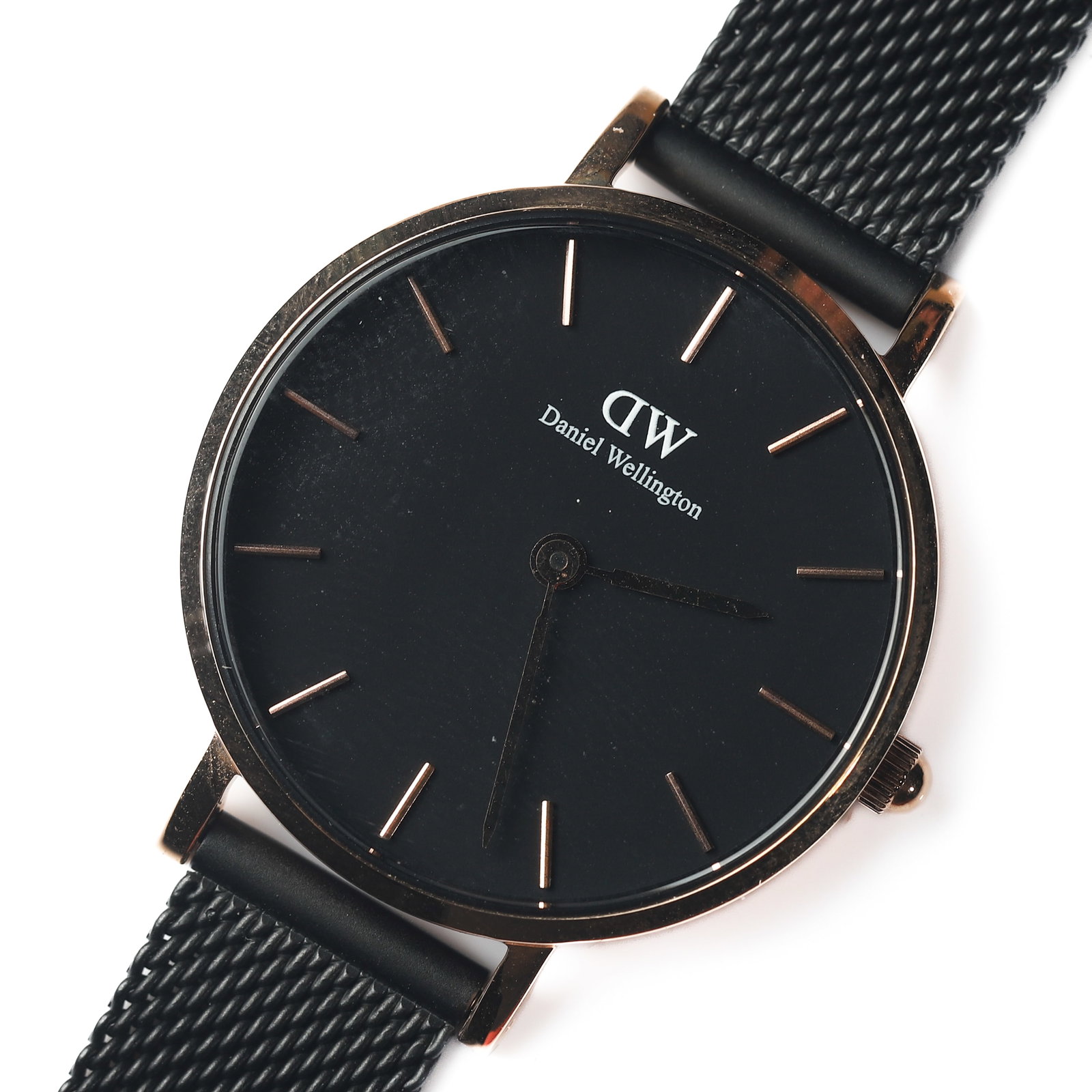 DANIEL WELLINGTON STAINLESS STEEL QUARTZ WRISTWATCH: Dimensions Dial diameter 1 3/16 in. (30.1 mm) Overall length 8 7/8 in. (22.5 cm) Description A Daniel Wellington stainless steel quartz wristwatch, featuring a black dial with rose gold-tone baton