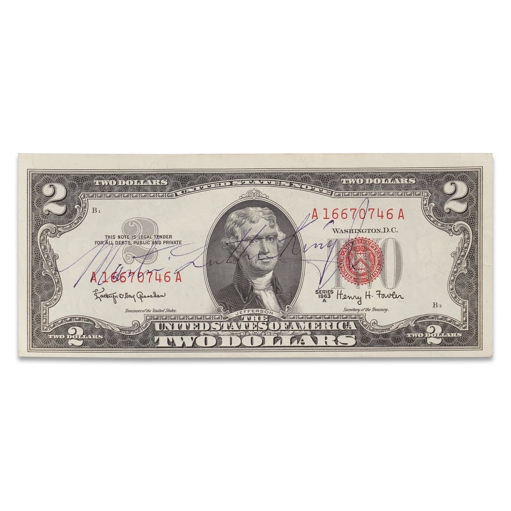 MARTIN LUTHER KING JR. SIGNED 1963 $2 RED SEAL UNITED STATES NOTE: 6 1/8 x 2 5/8 in (15.5 x 6.6 cm) Provenance and Authentication: According to the Letter of Authenticity (LOA) and Certificate of Authenticity (COA) provided by the consignor, this collectible was subj