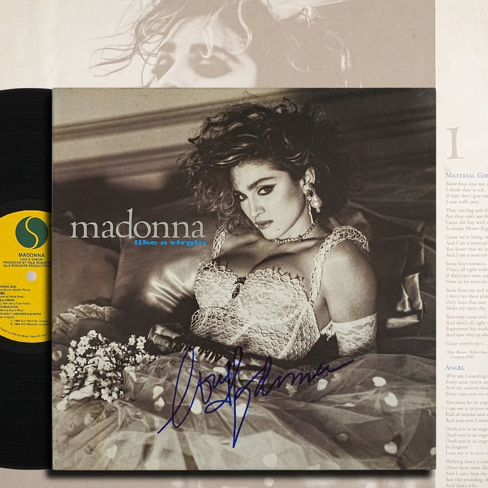 MADONNA SIGNED "LIKE A VIRGIN" US FIRST EDITION LP: 12 1/4 x 12 1/4 in Provenance and Authentication: According to the Letter of Authenticity (LOA) and Certificate of Authenticity (COA) provided by the consignor, this collectible was subjected to a for
