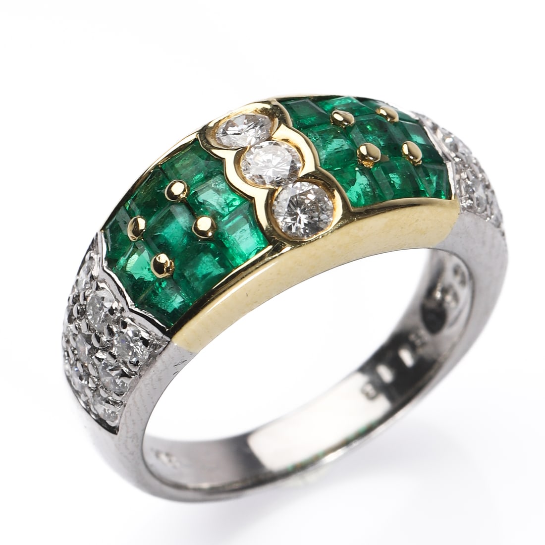 RETRO 18K GOLD AND PLATINUM EMERALD AND DIAMOND RING: Dimensions Inner diameter: 21/32 in (16.7 mm); Weight: 7.9 g Description A Retro-period ring finely crafted in 18k yellow gold and platinum, set with approximately 1.18 carats of square-cut emeralds a
