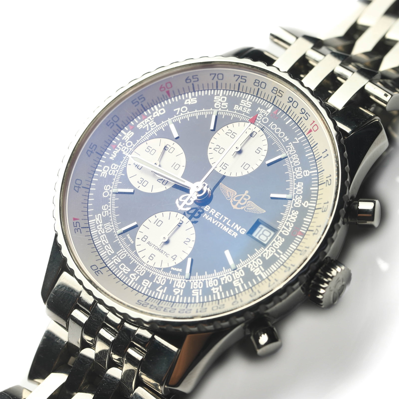BREITLING NAVITIMER STAINLESS STEEL AUTOMATIC CHRONOGRAPH WRISTWATCH: Dimensions Case Diameter 1 3/4 in. (4.43 cm) Weight 141.2g Description A Breitling Navitimer stainless steel automatic chronograph wristwatch featuring a black dial with contrasting silver-tone