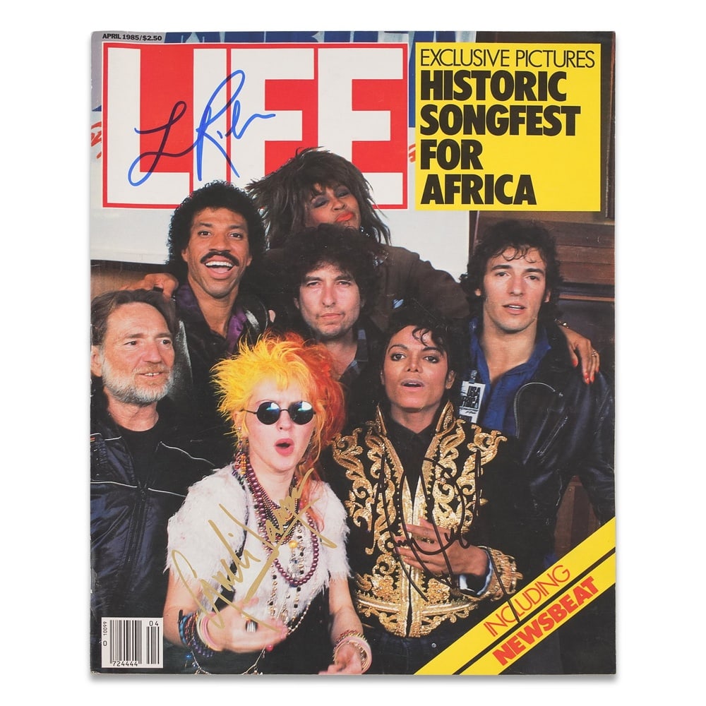 MICHAEL JACKSON, CYNDI LAUPER & LIONEL RICHIE SIGNED LIFE MAGAZINE - APRIL 1985 "WE ARE THE WORLD": 12 7/8 x 10 in (32.7 x 25.5 cm) Provenance and Authentication: According to the Letter of Authenticity (LOA) and Certificate of Authenticity (COA) provided by the consignor, this collectible was subje