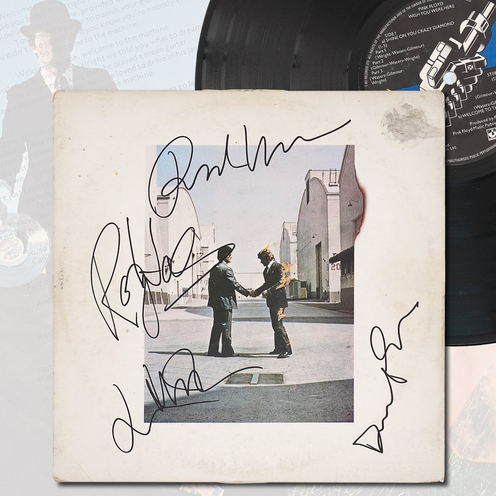 PINK FLOYD FULLY SIGNED "WISH YOU WERE HERE" LP: 12 1/4 x 12 1/4 in Provenance and Authentication: According to the Letter of Authenticity (LOA) and Certificate of Authenticity (COA) provided by the consignor, this collectible was subjected to a for