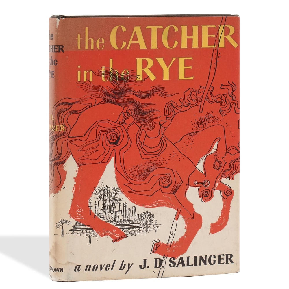 J. D. SALINGER SIGNED "THE CATCHER IN THE RYE": 8 1/8 x 5 5/8 in (20.5 x 14.4 cm) Provenance and Authentication: According to the Letter of Authenticity (LOA) and Certificate of Authenticity (COA) provided by the consignor, this collectible was sub