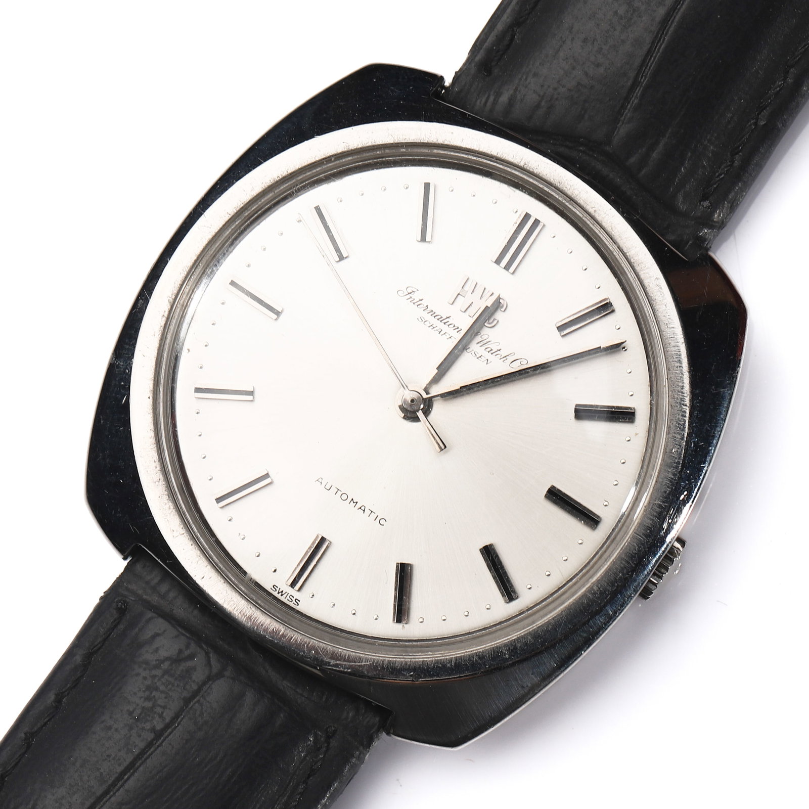INTERNATIONAL WATCH CO. (IWC) AUTOMATIC WRISTWATCH: Dimensions Case diameter approximately 1 15/32 in. (37.4 mm); overall length approximately 9 7/16 in. (24 cm). Description An elegant vintage wristwatch by International Watch Co. (IWC), featuring a s