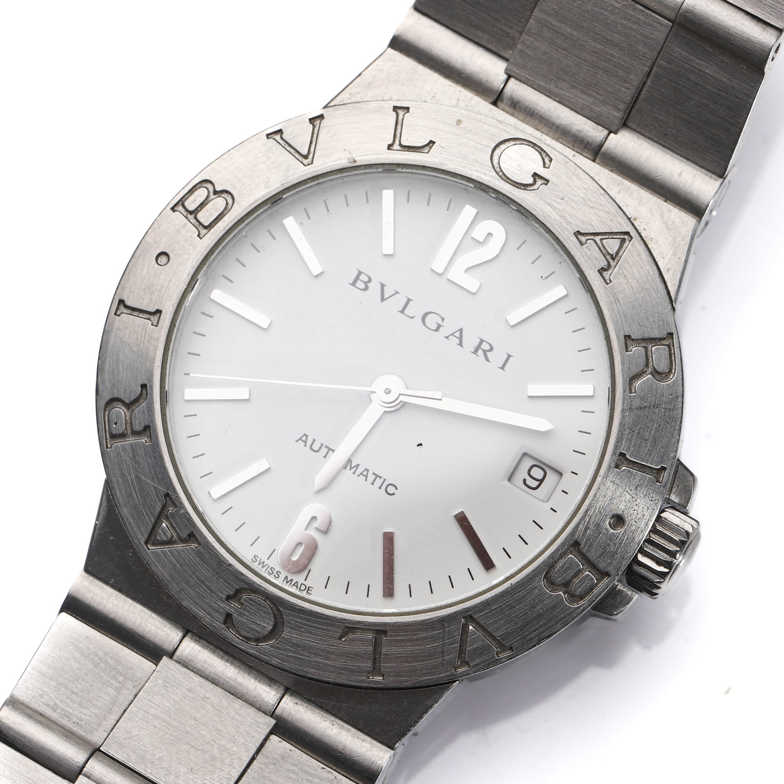 BVLGARI AUTOMATIC STAINLESS STEEL WRISTWATCH: Dimensions Dial diameter approximately 1 1/2 in. (38.5 mm). Description This elegant Bulgari automatic wristwatch features a stainless steel case with the iconic engraved BVLGARI bezel, framing a clea