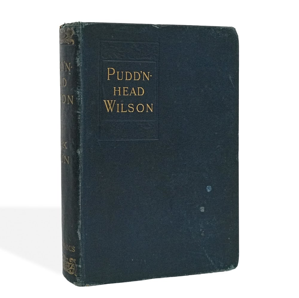 MARK TWAIN (1835-1910) SIGNED "PUDD'NHEAD WILSON" BOOK, 1894: 7 3/4 x 5 3/8 in (19.6 x 13.5 cm) Provenance and Authentication: According to the Letter of Authenticity (LOA) and Certificate of Authenticity (COA) provided by the consignor, this collectible was