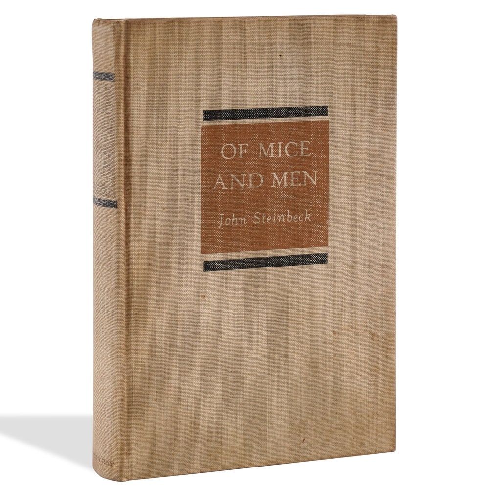 JOHN STEINBECK SIGNED "OF MICE AND MEN" BOOK: 7 1/2 x 5 1/8 in (19.2 x 13 cm) Provenance and Authentication: According to the Letter of Authenticity (LOA) and Certificate of Authenticity (COA) provided by the consignor, this collectible was