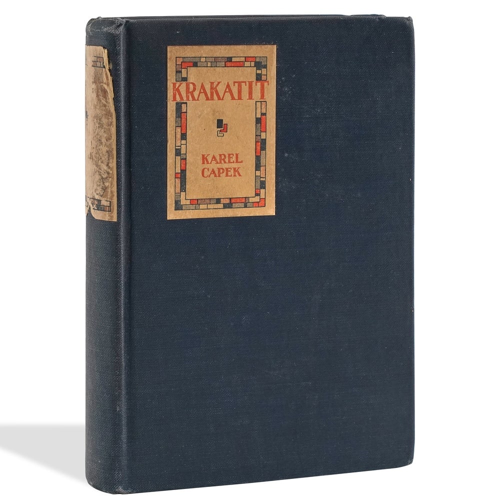 KAREL CAPEK SIGNED "KRAKATIT" BOOK: 7 5/8 x 5 3/8 in (19.5 x 13.6 cm) Provenance and Authentication: According to the Letter of Authenticity (LOA) and Certificate of Authenticity (COA) provided by the consignor, this collectible was