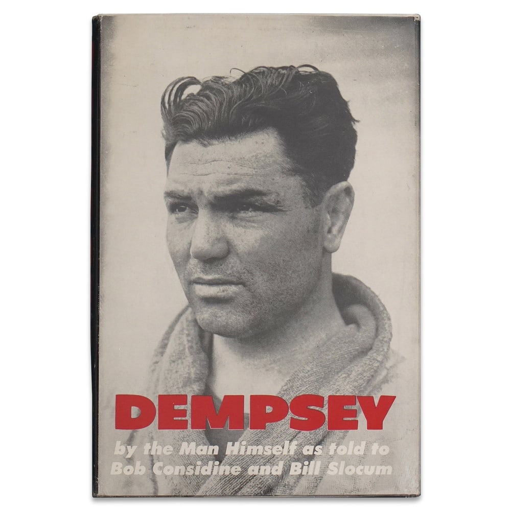 JACK DEMPSEY SIGNED "DEMPSEY: BY THE MAN HIMSELF" BOOK, FIRST PRINTING: 8 5/8 x 5 7/8 in (22 x 14.8 cm) Provenance and Authentication: According to the Letter of Authenticity (LOA) and Certificate of Authenticity (COA) provided by the consignor, this collectible was