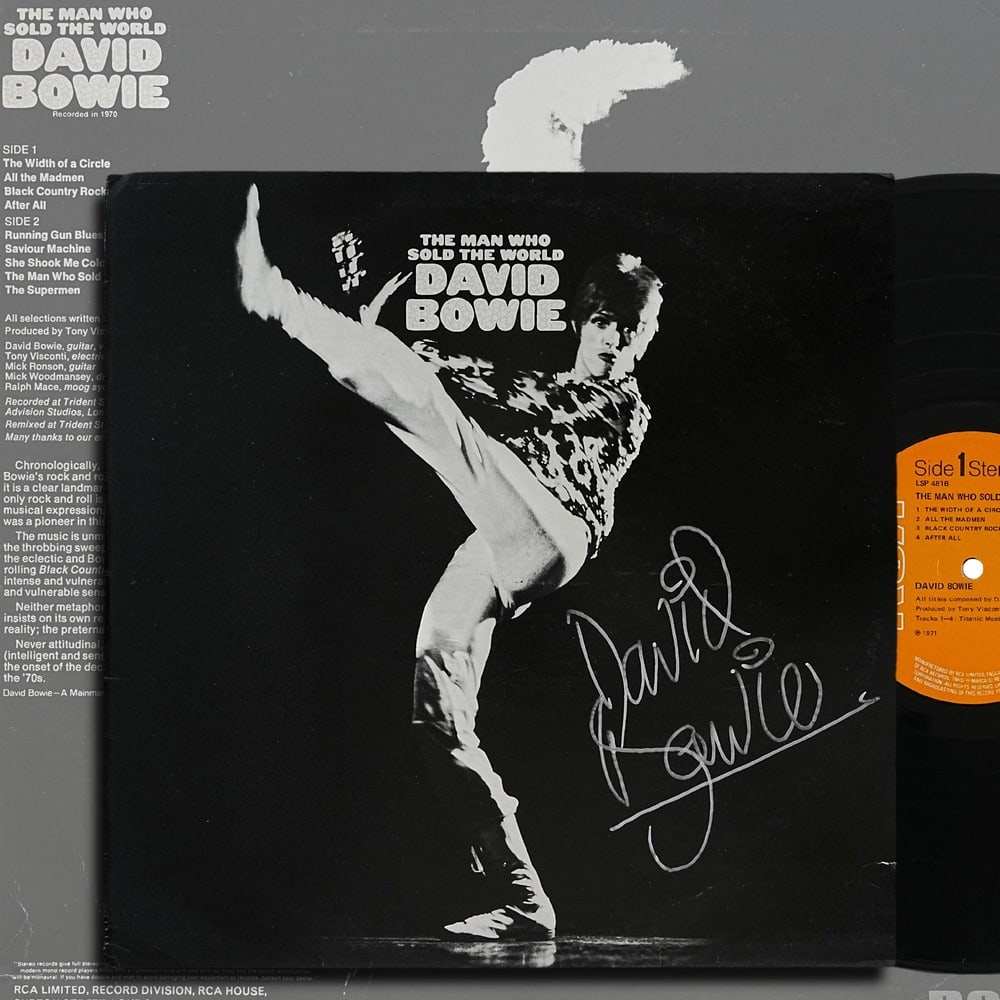 DAVID BOWIE SIGNED "THE MAN WHO SOLD THE WORLD" LP: 12 1/4 x 12 1/4 in Released in 1970, The Man Who Sold the World stands among David Bowie's most influential early recordings and represents a pivotal chapter in the evolution of modern rock music. Fea