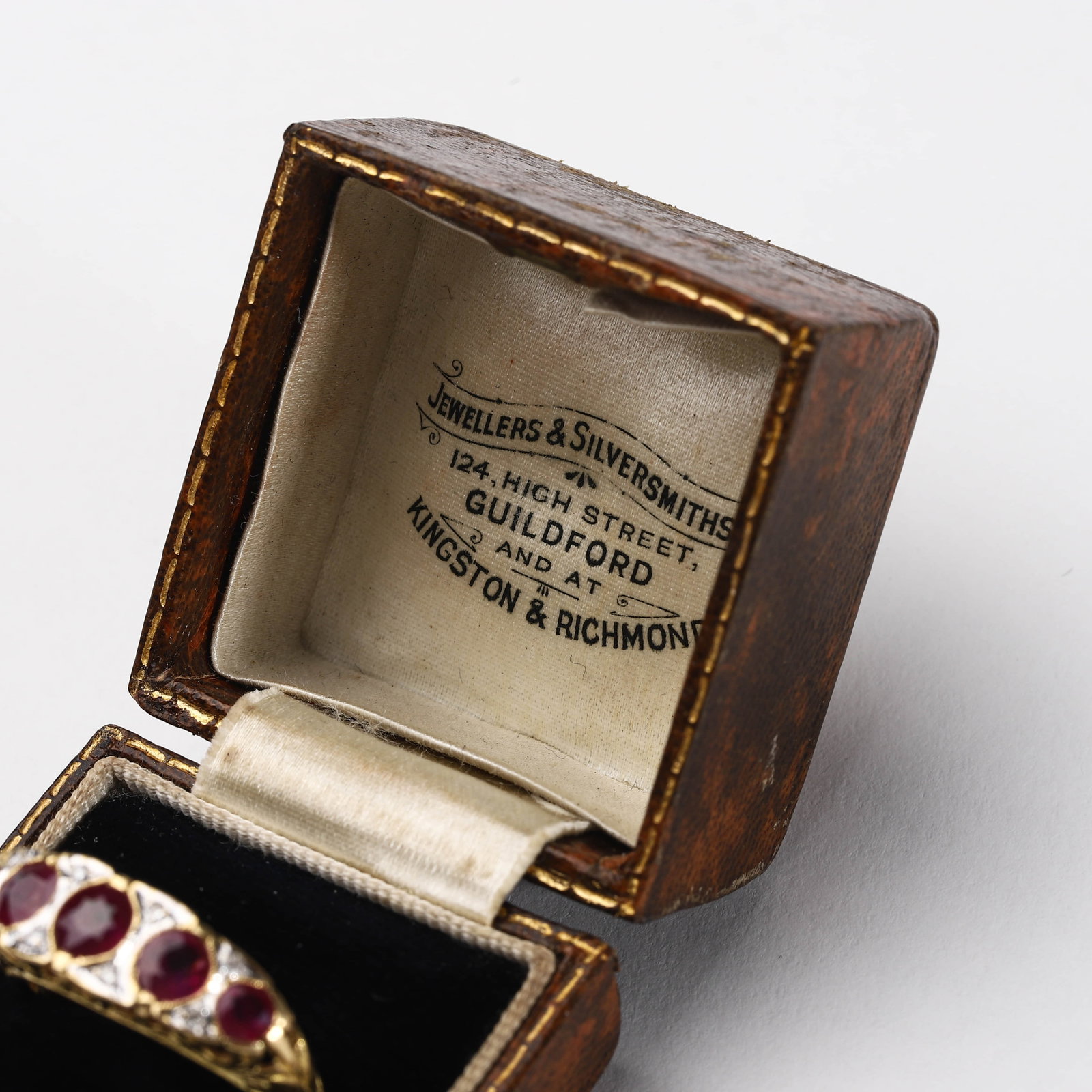 AN ANTIQUE RUBY AND DIAMOND FIVE-STONE RING, CIRCA 1900 - 2