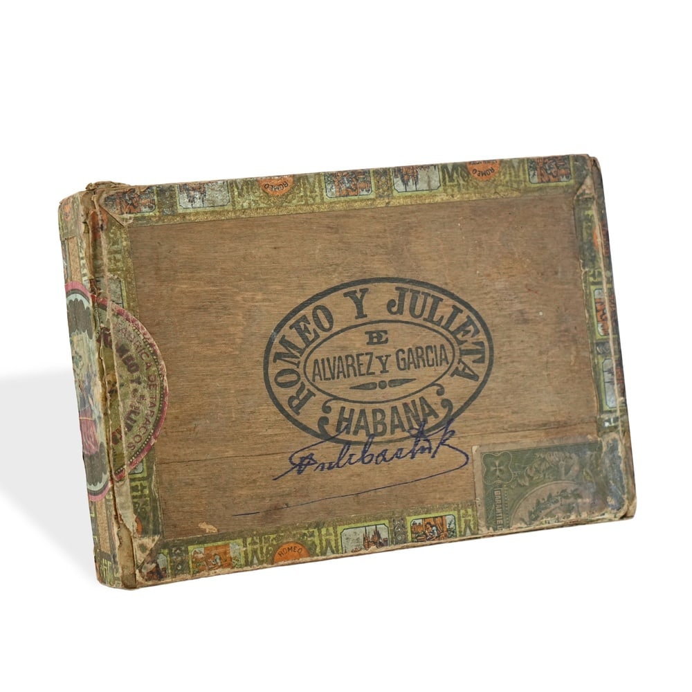 FIDEL CASTRO SIGNED "ROMEO Y JULIETA" CUBAN CIGAR BOX: 7 5/8 x 5 1/8 x 1 3/8 in (19.3 x 13 x 3.5 cm) Provenance and Authentication: According to the accompanying documentation provided by the consignor, the signatures have been examined with reference to 