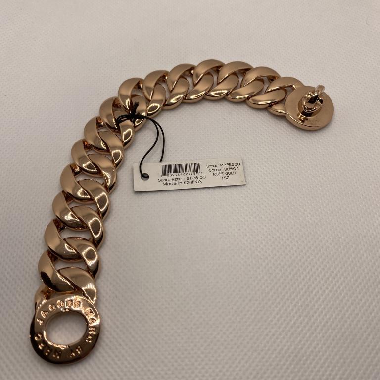 MARC JACOBS ROSE TONE LINK BRACLET WITH BAG MSRP: MSRP $128.00 SEE PHOTOS