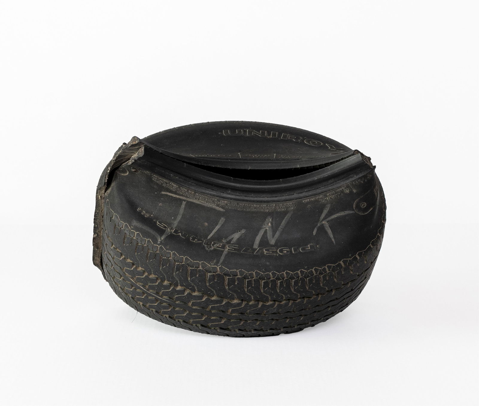 Chakaia Booker, b. 1953, A Bead (Junk): Chakaia Bookerb. 1953A Bead (Junk)1995rubber tire, nails, chalk17 x 17-1/2 x 12 inchesSigned and dated on bottom.Exhibited in Booker's first installation exhibition, "The Observance Instal