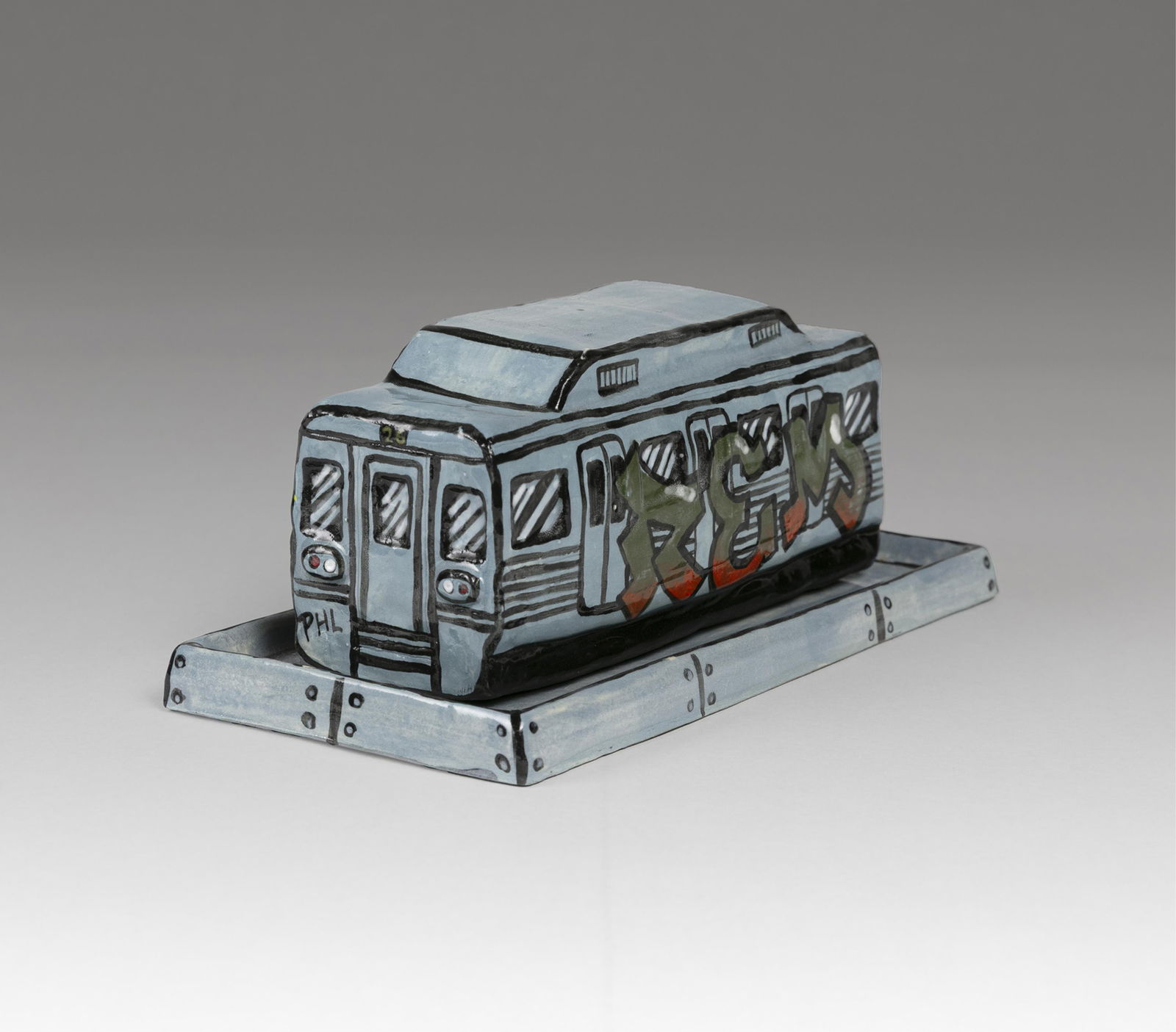 Roberto Lugo, b. 1981, untitled: Roberto Lugob. 1981untitledc. 2023glazed ceramic butter dish7-3/4 x 4 inches (dish)3 x 6 x 2-1/4 inches (car)