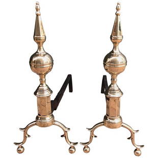 Pair of 18th Century American Steeple Top Andirons: Late 18th century American New York steeple top andirons with S-scrolled legs and spurs ending in ball feet. The body is brass with hand-wrought iron shaft.