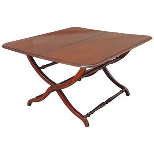 19th C British Colonial Campaign or Coaching Table: This large, solid mahogany British Colonial campaign table was made in the Caribbean in the early-19th century, circa 1800. The West Indies table has a traditional Jamaican two-board banquet end top