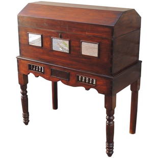 19th C Spanish Colonial Cedar Wedding Case on Stand: This wedding case on stand was made in the early half of the 19th century, circa 1800, and is made of Mexican cedar. This case has a dome top with simple sides and three rectangle mirror panels. The