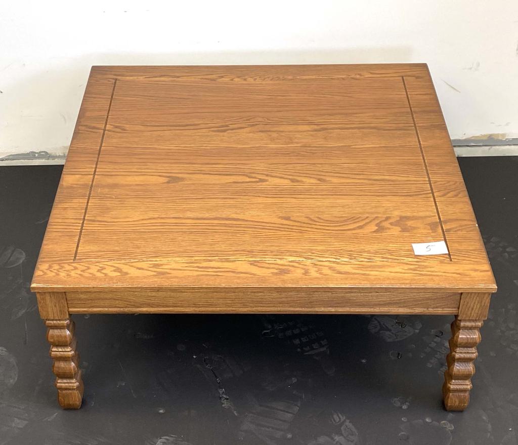 Solid Wood Coffee Table: 36"x36"x15" This coffee table is a good size. Solid and heavy. This has some minor scratches. Turned wood legs.