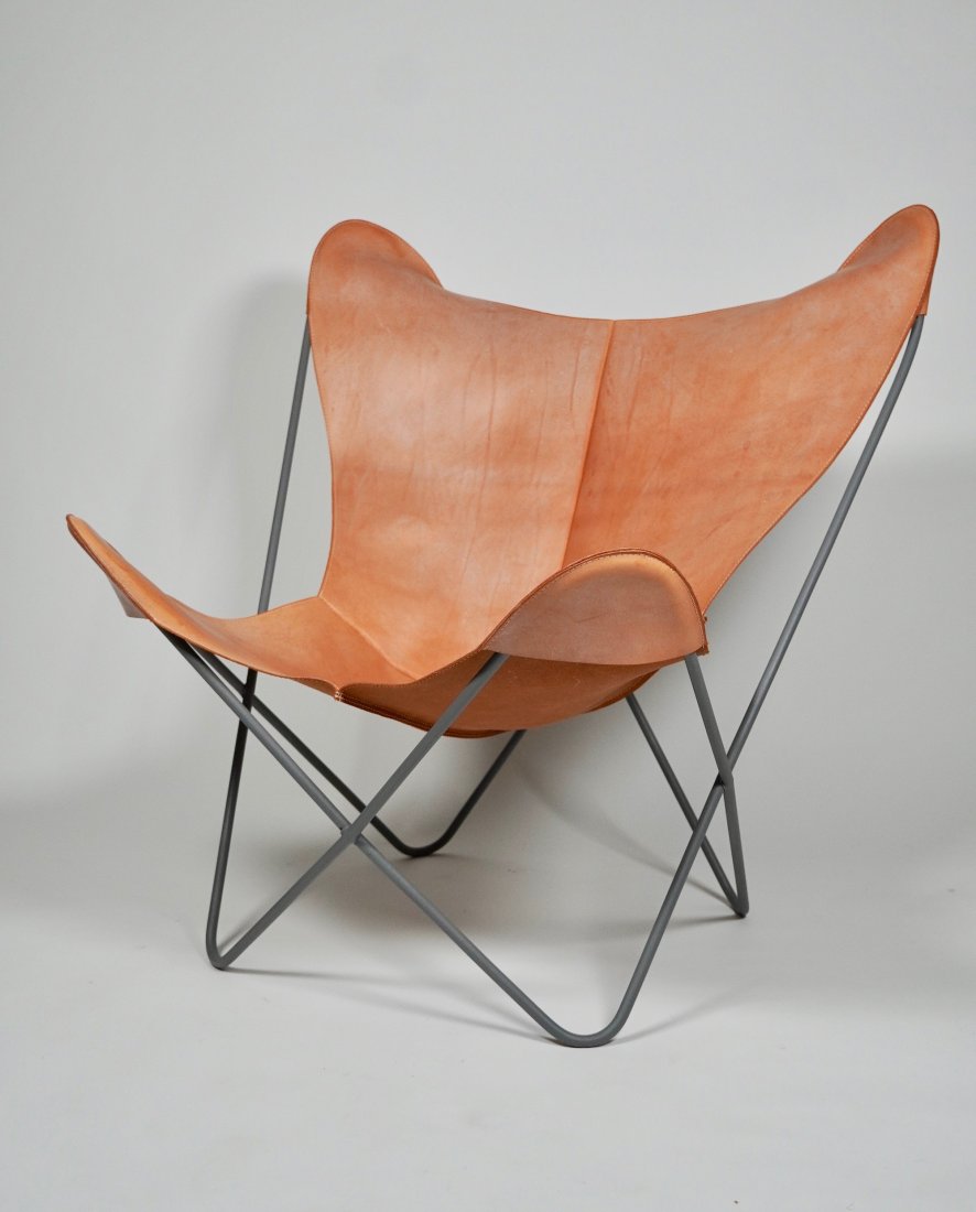 Knoll Hardoy / Butterfly Lounge in Leather: Knoll Butterfly / Hardoy lounge in tan leather with gray iron frame, 27" W x 28" D x 33.5" H x 13.5'" Seat H.