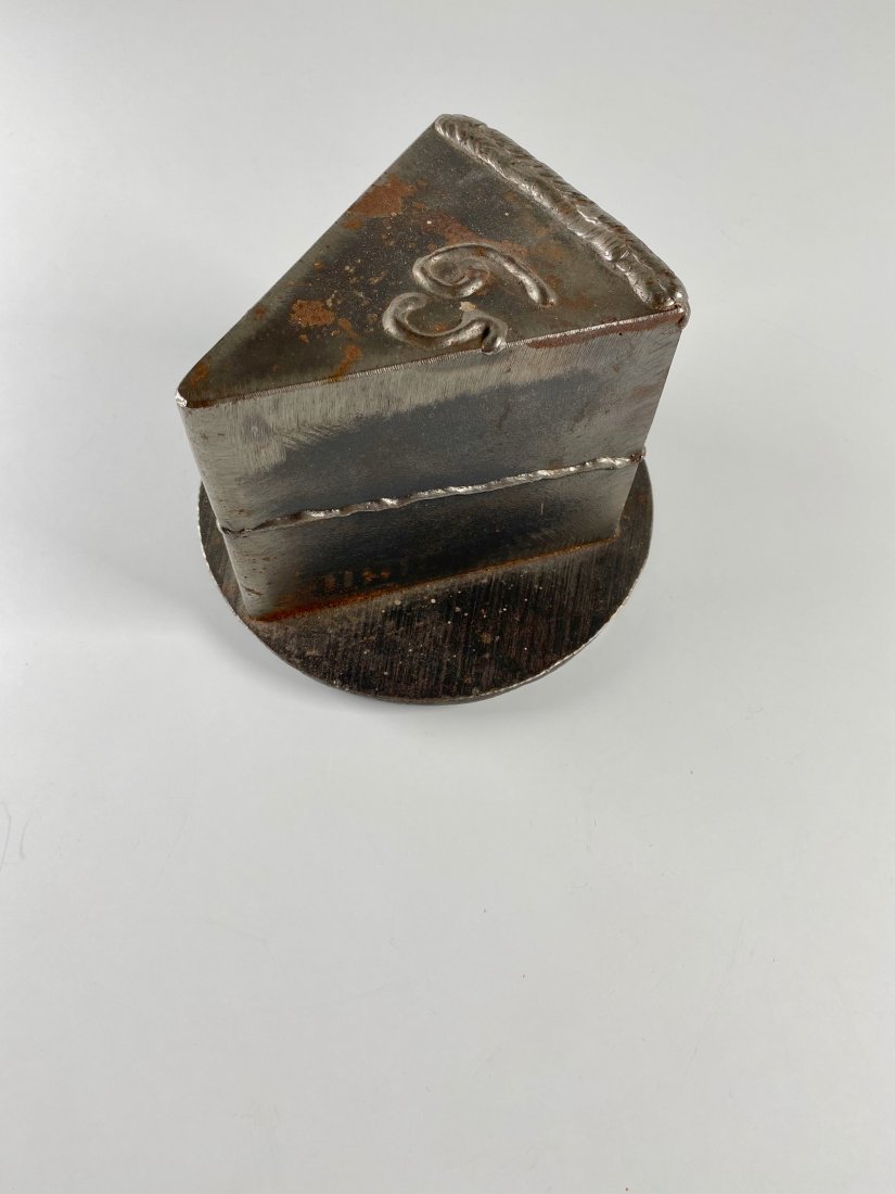 Pop Art Metal Slice of Cake Sculpture: Pop Art sculpture of a piece of a cake slice created out of welded steel done in the style of Claes Oldenburg, artist unknown. Whimsical take on a everyday object created out of an unconventional mate