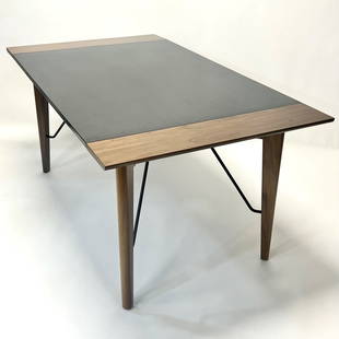 Greta Grossman Expanding Walnut Dining Table for Glenn of California, 1952: Rare and iconic expanding walnut & black laminate dining table with iron cross-stretchers by famous Swedish/California designer/architect, Greta Grossman for Glenn of California circa 1952. This table