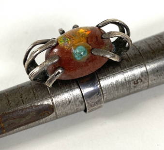Pal Kepenyes Silver Ring with Mexican Opal in Matrix: Ring crafted by Pal, size 4.5, having a Mexican opal in matrix, not signed, purchased directly from the artist by the original owners during the 1960s, 1.25" W x .75" D x .5 H".