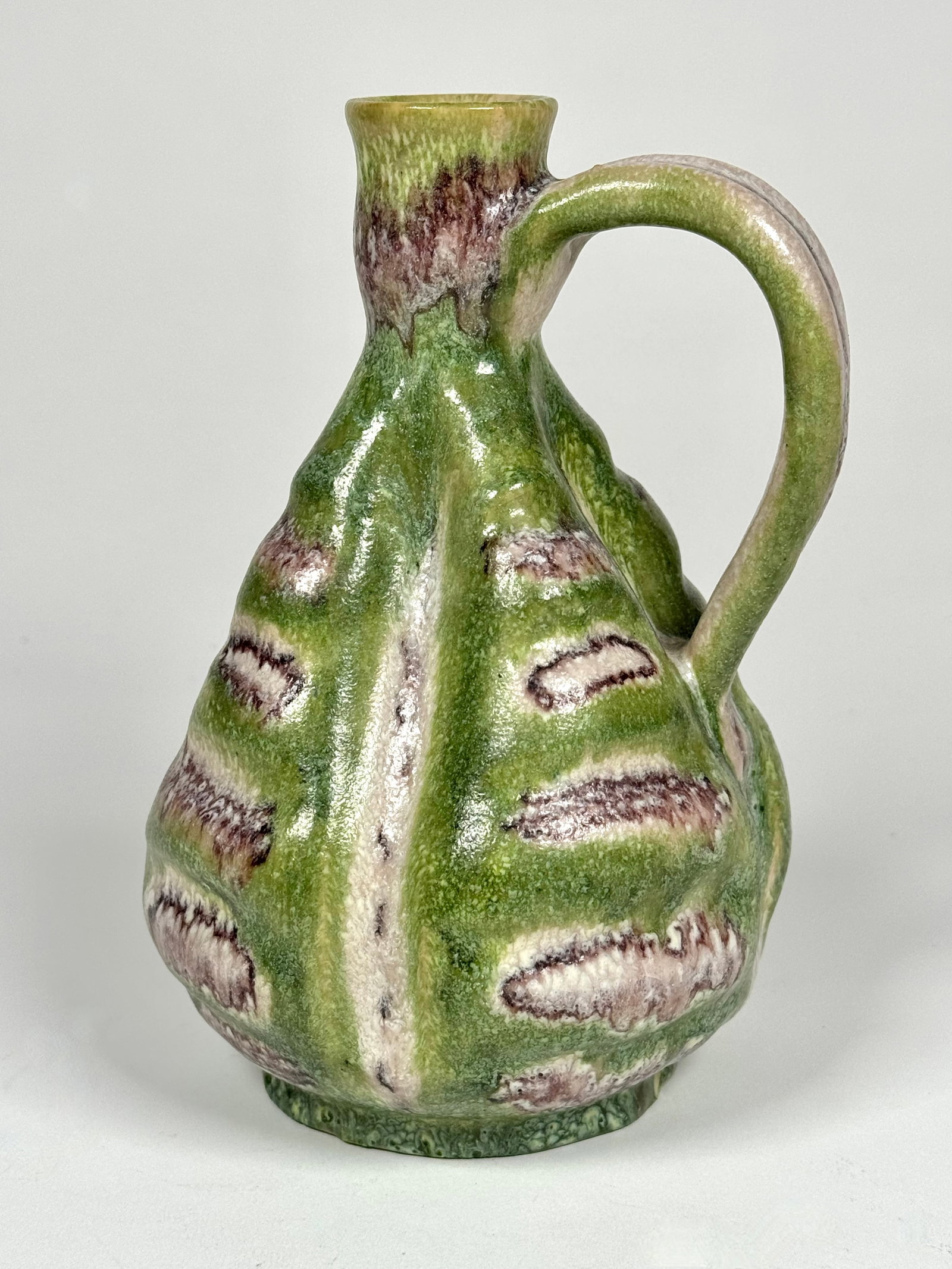 Guido Gambone (1909-1969) Studio Ceramic Jug, Italy: Multi-colored jug with handle, makers mark on the bottom, 7.75" H x 4.75" Dia.