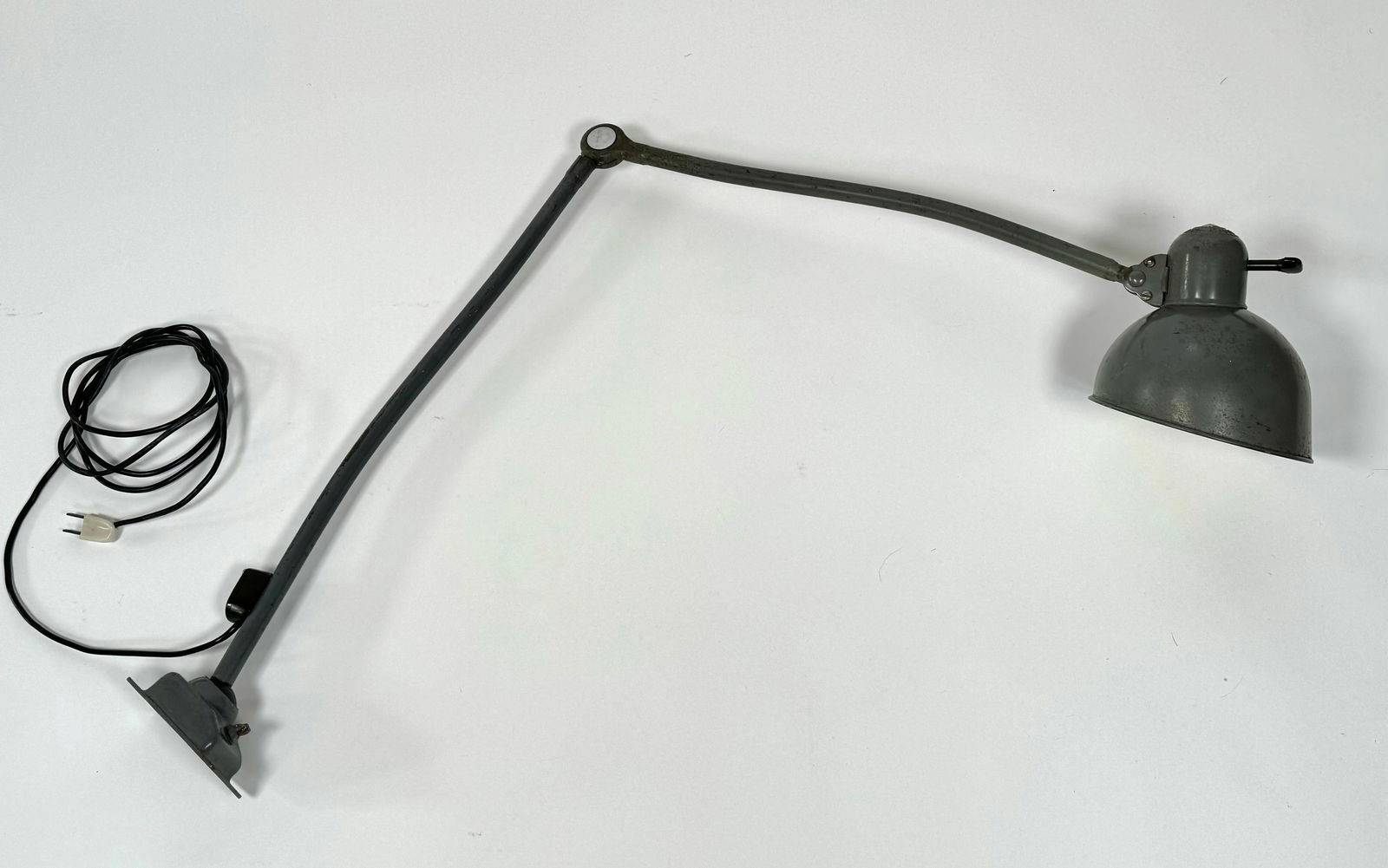 Kaiser Idell Task Lamp by Christian Dell Bauhaus: Gray task lamp, adjust at the shade and in the middle of the two piece arm assembly 44" L x 6"Dia, markers mark on top of shade