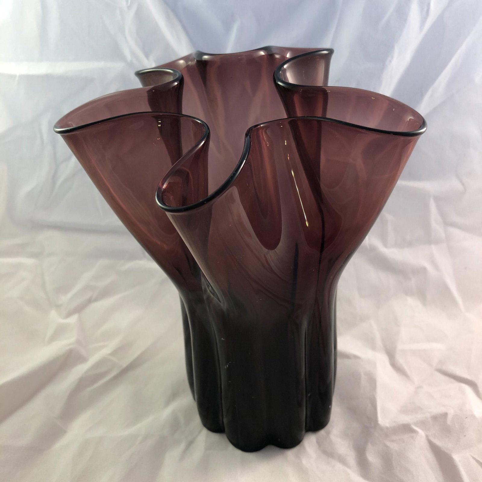 Purple Hand Blown Glass Vase: Purple Hand Blown Glass Vase with folds and ribs. Unsigned circa 1950's