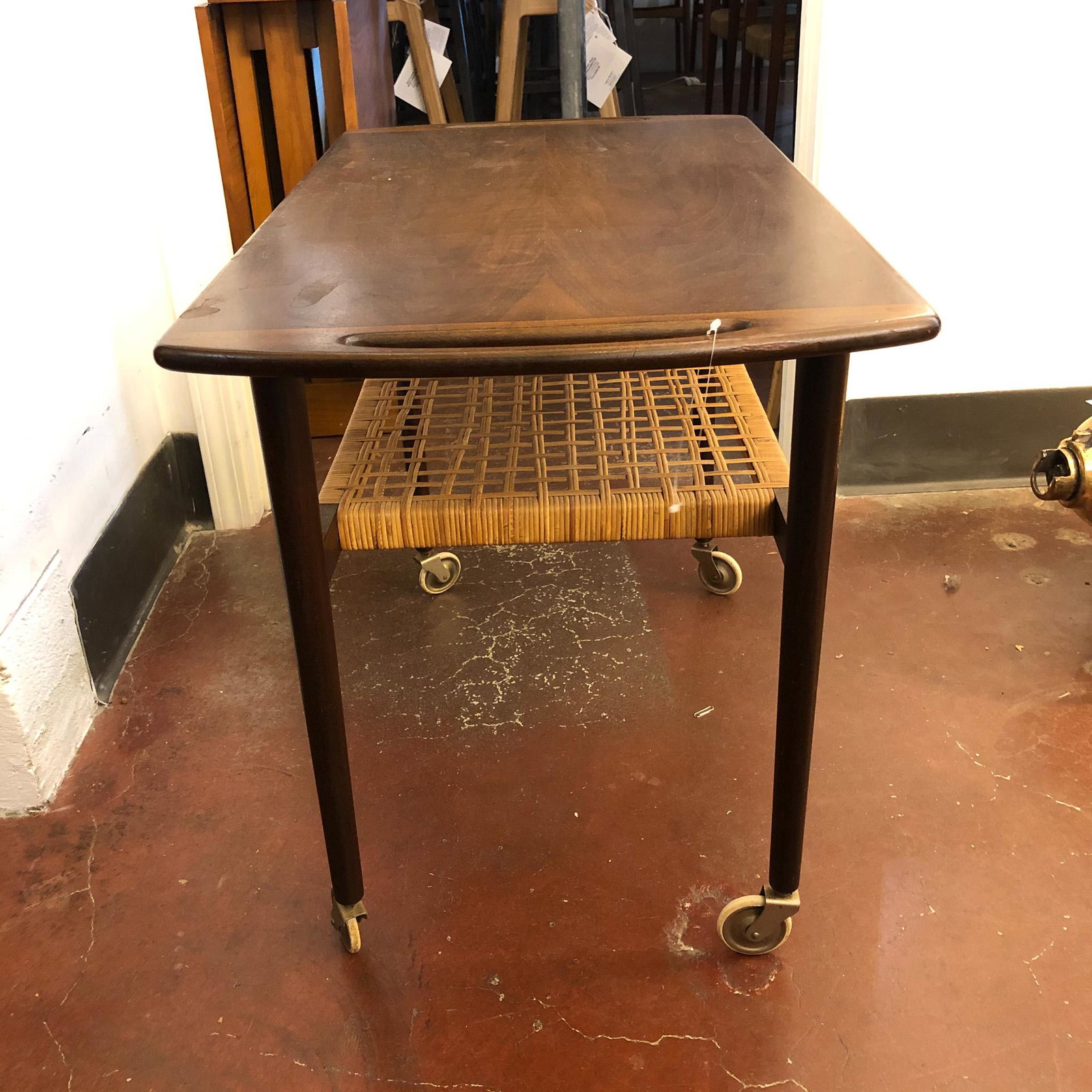 Vintage N.O. Moeller Rolling Bar Cart: N.O. Moeller Rolling Bar Cart, Danish c.1950's for J.L. Moeller in Walnut with a lower shelf , on wheels Measures 33" x 19.5" x 23.5"