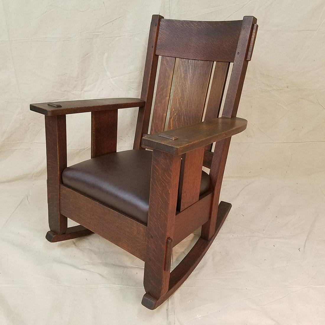 Charles Stickley Arts & Crafts Mission Oak Rocker: Antique large & very heavy Charles Stickley Arts & Crafts oak rocker w/ leather seat. Excellent condition. Fine original patina. Signed w/ decal on back seat stretcher. Super comfortable, well