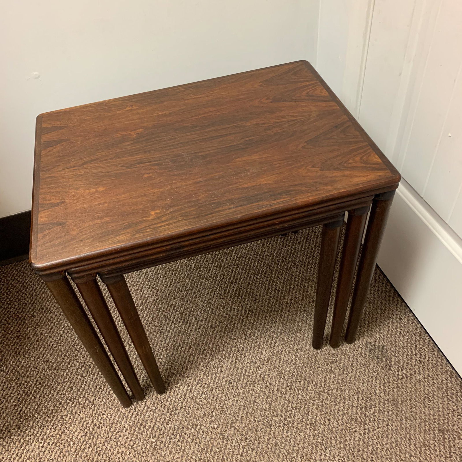 Rosewood Nest of Tables, Denmark: Rosewood Nest of Tables, Denmark, c. 1950's No marking, Original finish Measures 21.5" x 16" x 19"