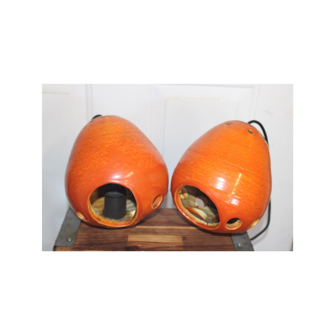 Pr of 1960s Ceramic ' Bee Hive' Pendanst, Netherlands: The pair of Ceramic' Bee Hive' Pendants from the Netherlands shown in classic Dutch color of Orange.Matte glaze and standard socket Condition is great Measures 9"h x 8" D