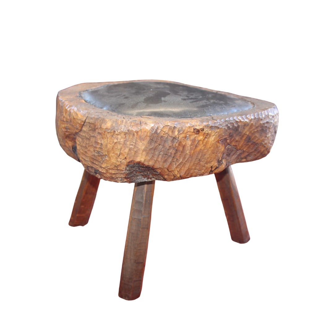 Brutalist Handcarved Footstool, France: Brutalist Handcarved Footstool, France. C. 1950 Artist unknown Condition is great. Tear in Black padded top. 15" x 17" x 15"