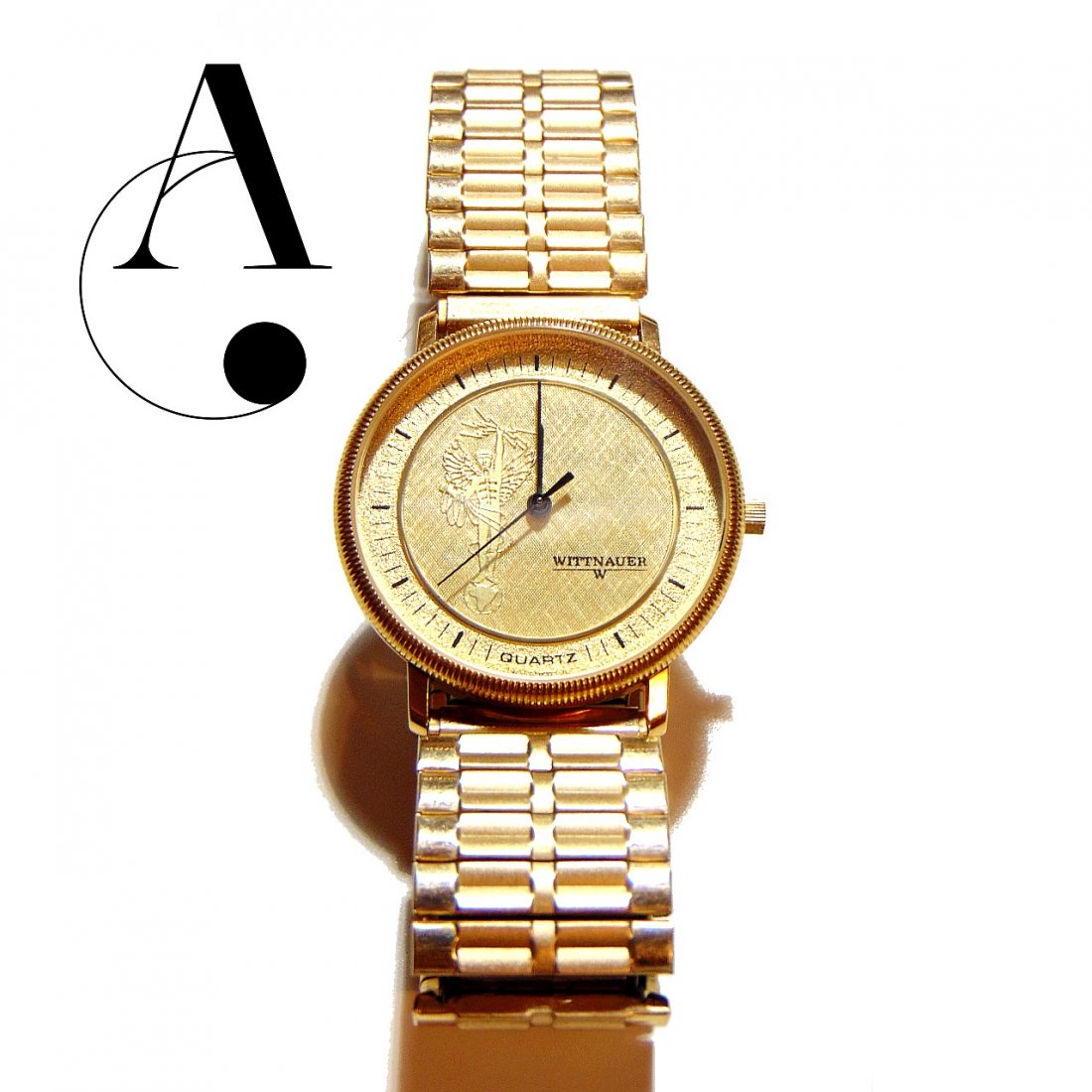 Vintage Watch: Rare WITTNAUER Swiss Quartz: Vintage Wittnauer Swiss Quartz Watch / Rare Faced featuring a Winged Man standing on a Globe / Model# MZ 5727 SWISS 1103 - Marked on Face / New Battery (January 2021) / Band has been replaced with a S