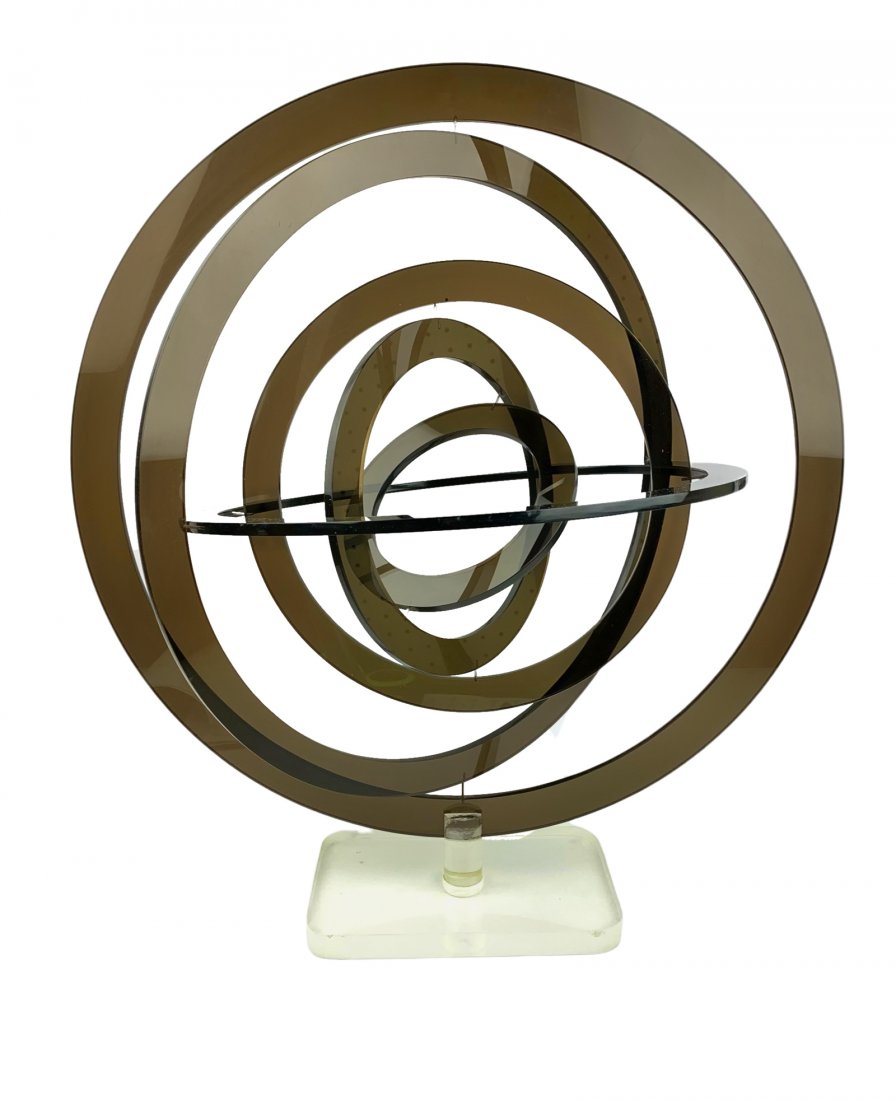 Large Mid Century Lucite Armillary Kinetic Sculputure: Great kinetic armillary sculpture in lucite. Unknown maker or designer. Brown and clear acrylic lucite. Measures at 20 3/4" x 18" with a 4 3/4" x 7 3/4" base.