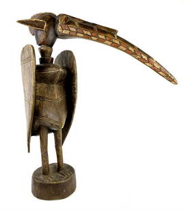 Vintage Large Senufo African Wood Bird Sculpture: Large hand carved wood sculpture decorated and painted. Two piece with head and base body. Appears to be quite old. Measures about 24" x 20" x 5 5/8" at base.