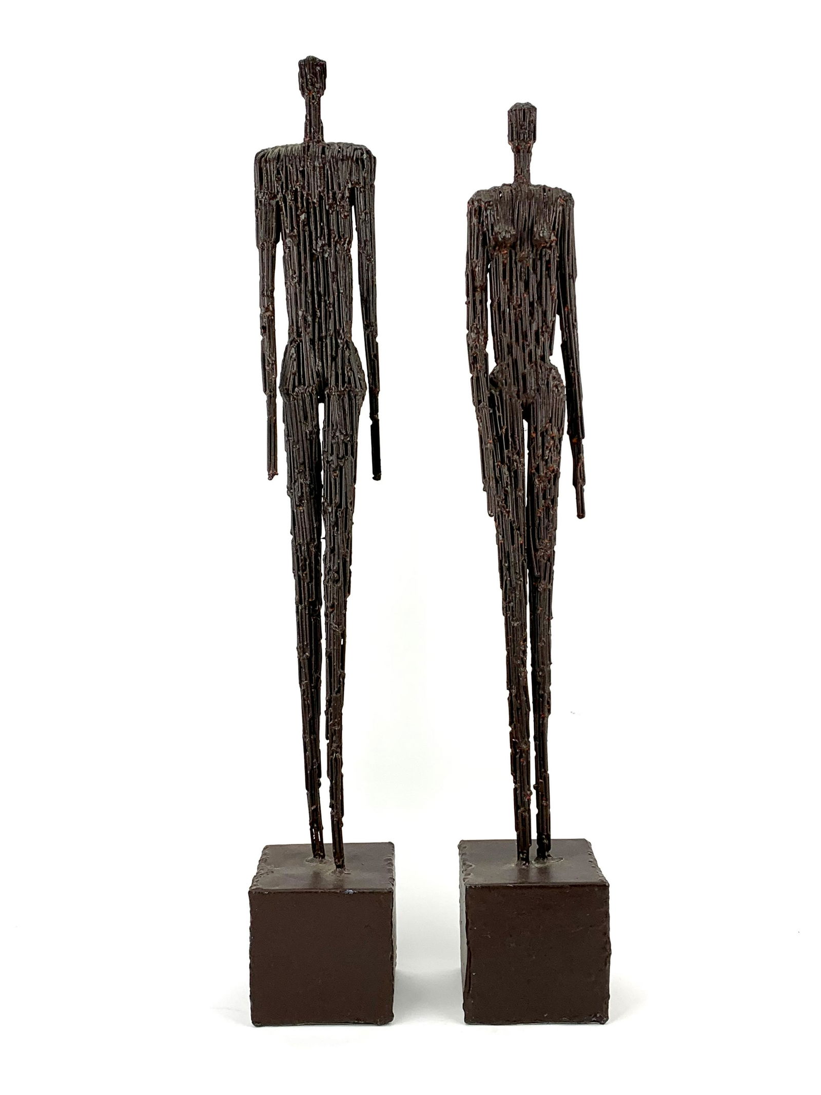 Brutalist Stylized Metal Man and Woman Sculptures (1 of 8)