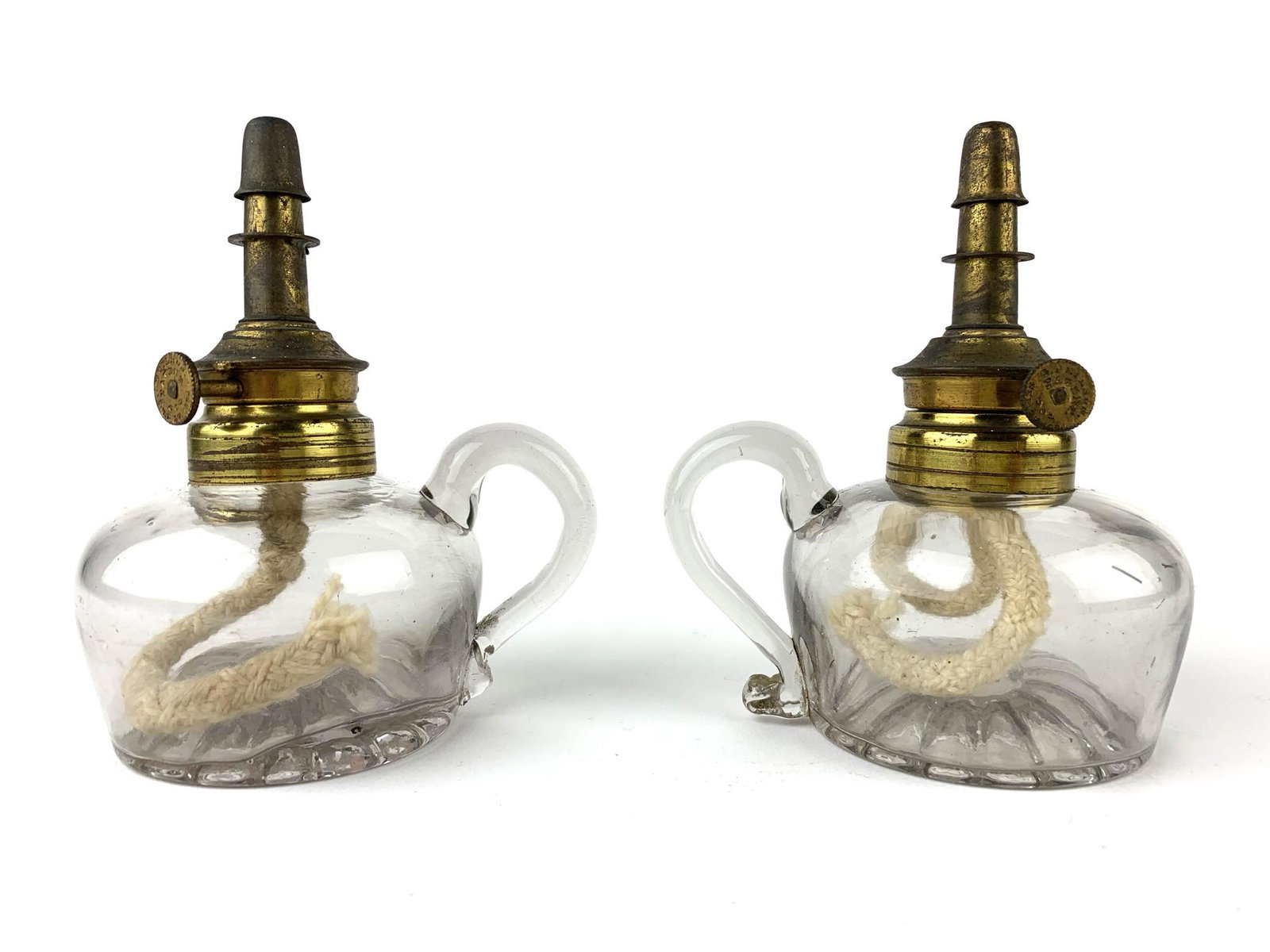 Antique 1864 G. Neilson Whale Oil Lamps: Pair of hand blown glass early oil lamp burners marked G. Neilson 1864. Measure 5 1/2" x 3 1/2".