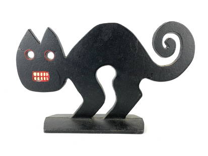 Vintage Black Cat Cast Iron Doorstop: Metropolitan Museum of Art 1989 and serial number stamped on backside. Scared cat folk art style cast iron doorstop. Measures 7 1/4" x 12"