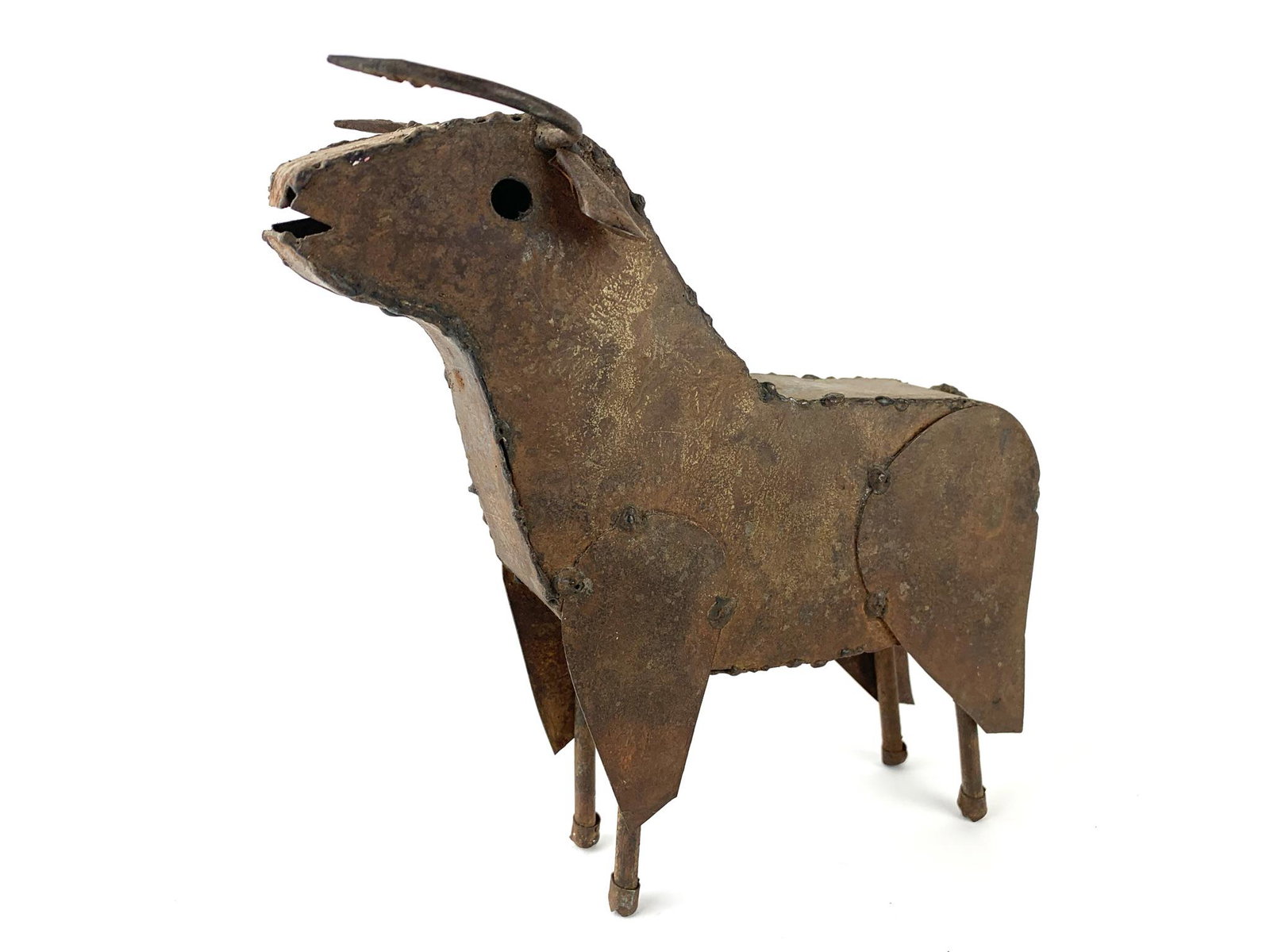 Manuel Felguerez Mexican Folk Art Metal Bull Sculpture: Metal bull folk art sculpture by Manuel Felguerez - unsigned. Measures 8 1/4" x 9" x 2"