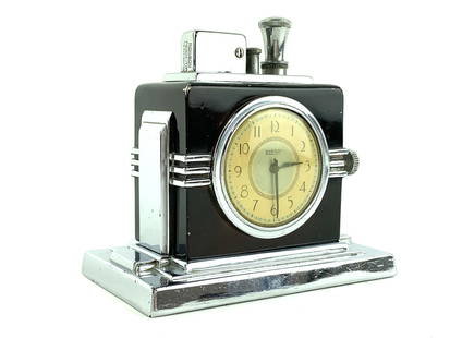 Art Deco Ronson Touch-Tip Clock Table Lighter: Stepped chrome and lacquer table lighter with clock center by Ronson. Measures 4 1/4" x 4 1/4" x 2 1/2"