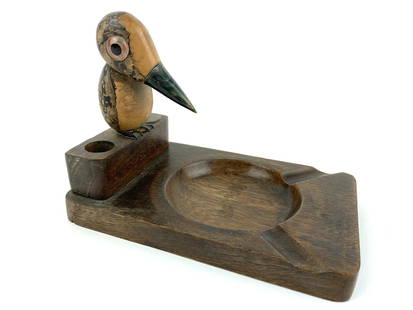 Art Deco Wood Toucan Pelican Glass Eye Ashtray: English wood carved Toucan Bird carved ashtray. Novelito marked on bottom. Measures 4 1/2"x 6" x 4"