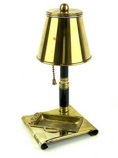 Art Deco Lamp Shape Cigarette Dispenser Ashtray: Brass and black metal lamp shaped cigarette dispenser ashtray by unknown maker. Measures 8 1/2" x 4 1/2" x 4"