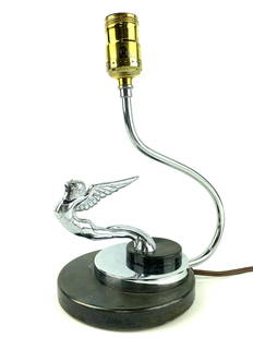 Art Deco Hood Ornament Desk Lamp: Winged woman figure mascot hood ornament lamp by unknown maker or designer. Measures 10 1/2" x 8 1/2" x 5 1/2"